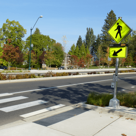 Crosswalk and pedestrian crossing sign