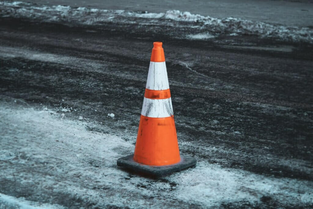 orange and white construction cone