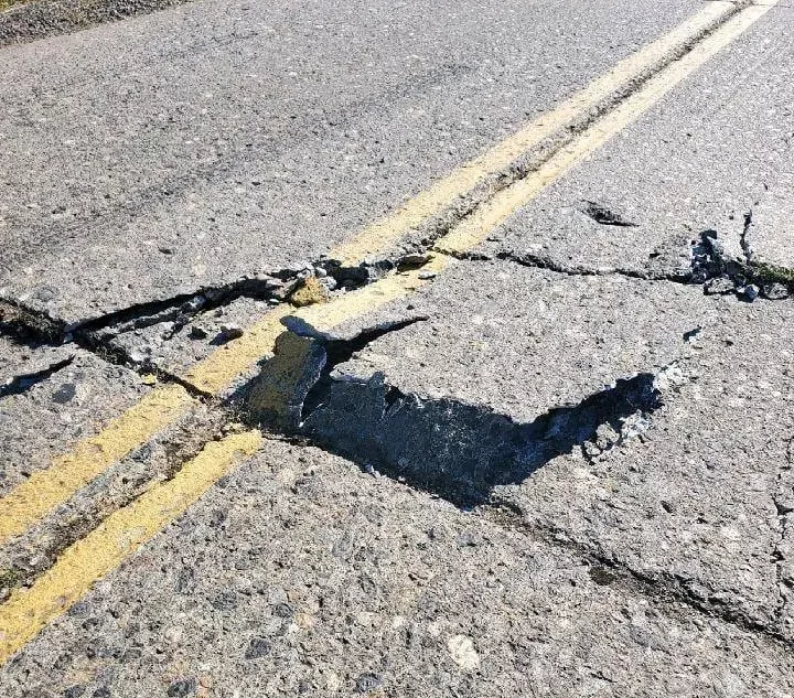 Dayton, OR road buckling damage