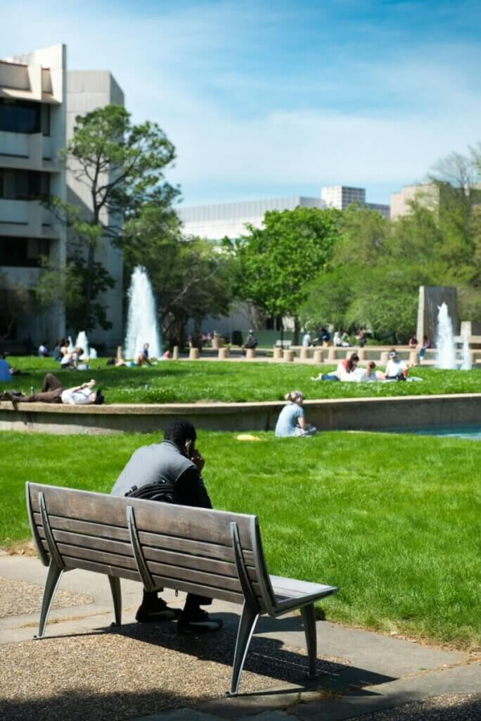 man sitting on park bench