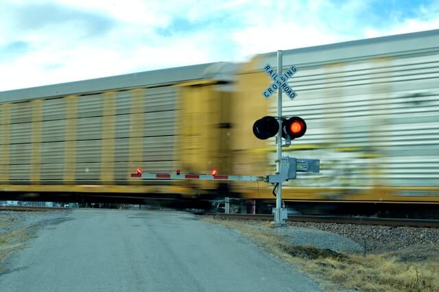 Train passing railroad crossing